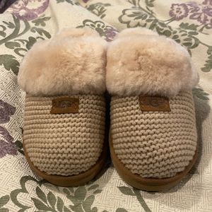 Ugg slippers.  Never worn.  Size 8.  Non- smoking home.